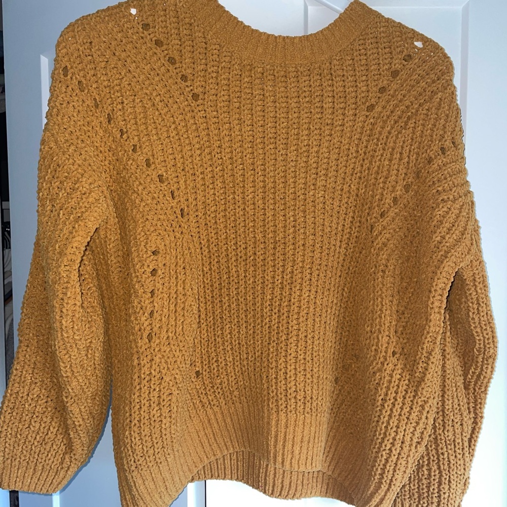 Yellow crew neck sweater with ribbed texture
